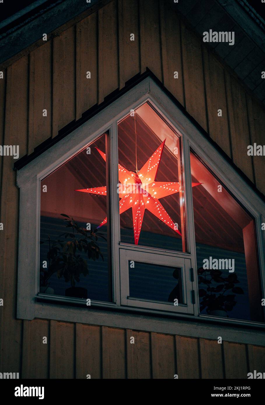 Christmas star in a big window seen from outside Stock Photo Alamy