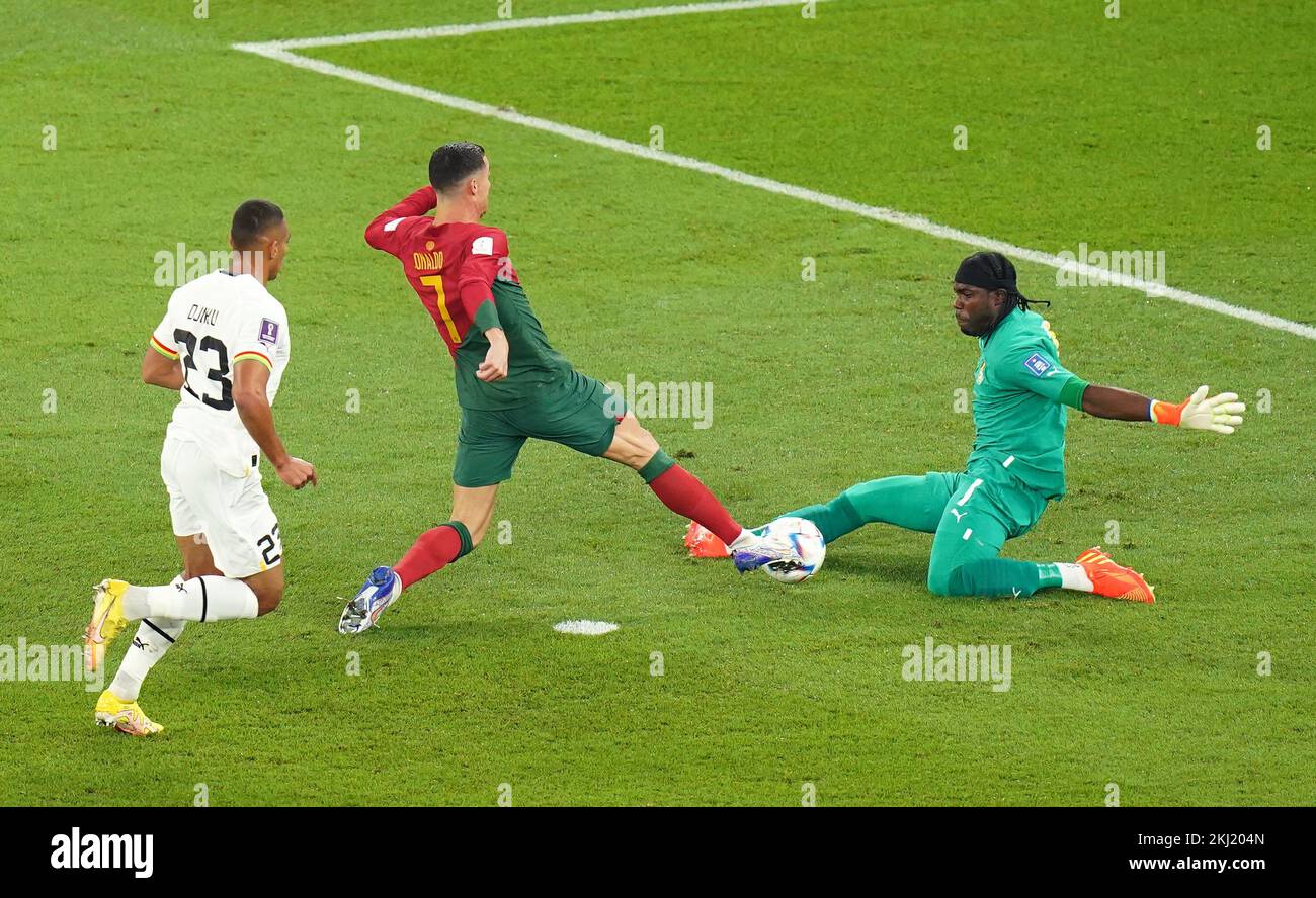 Portugal's Cristiano Ronaldo is denied by Ghana goalkeeper Lawrence Ati-Zigi during the FIFA World Cup Group H match at Stadium 974 in Doha, Qatar. Picture date: Thursday November 24, 2022 Stock Photo - Alamy