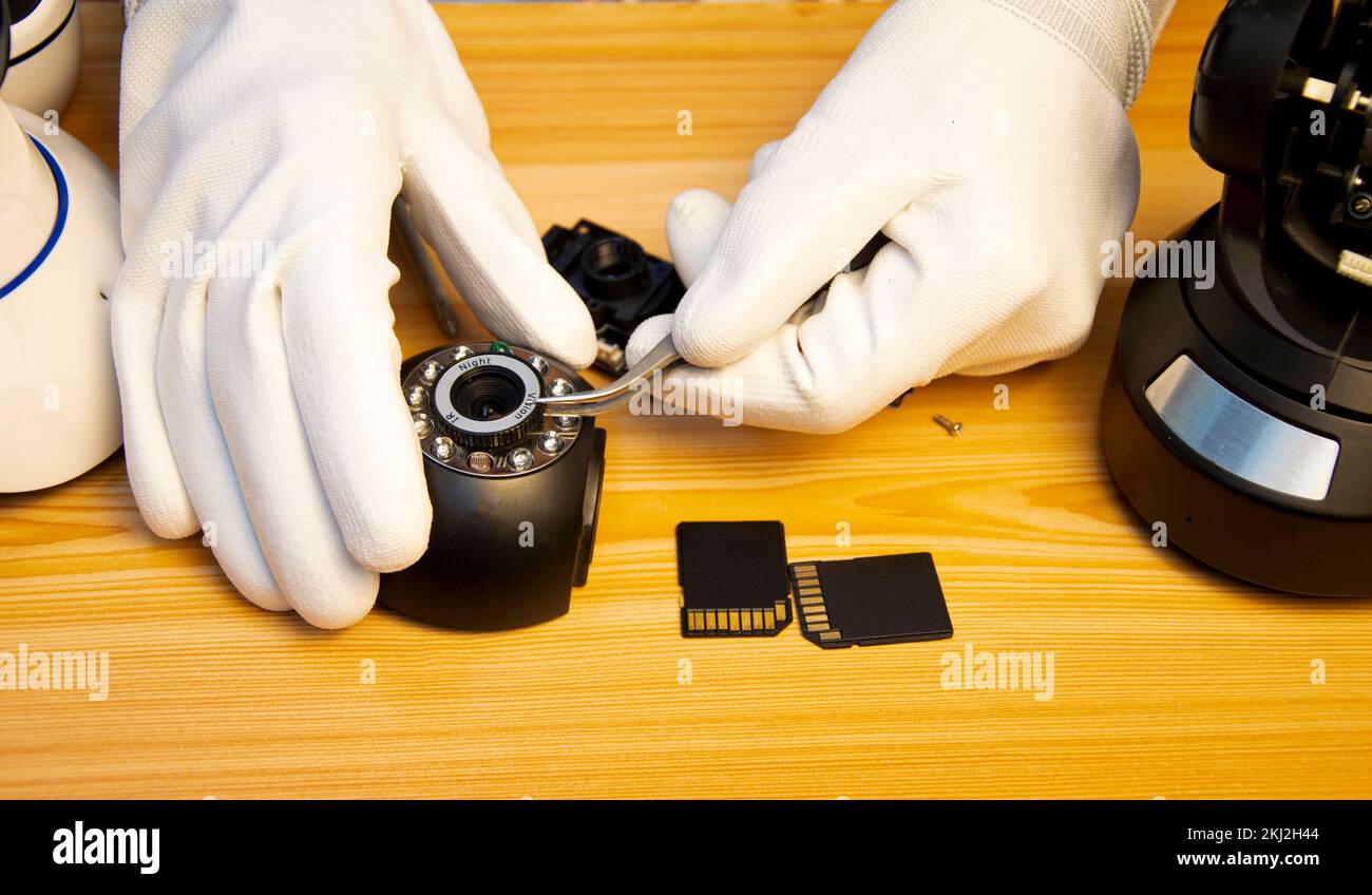 Remove the ip camera to repair cctv Stock Photo Alamy