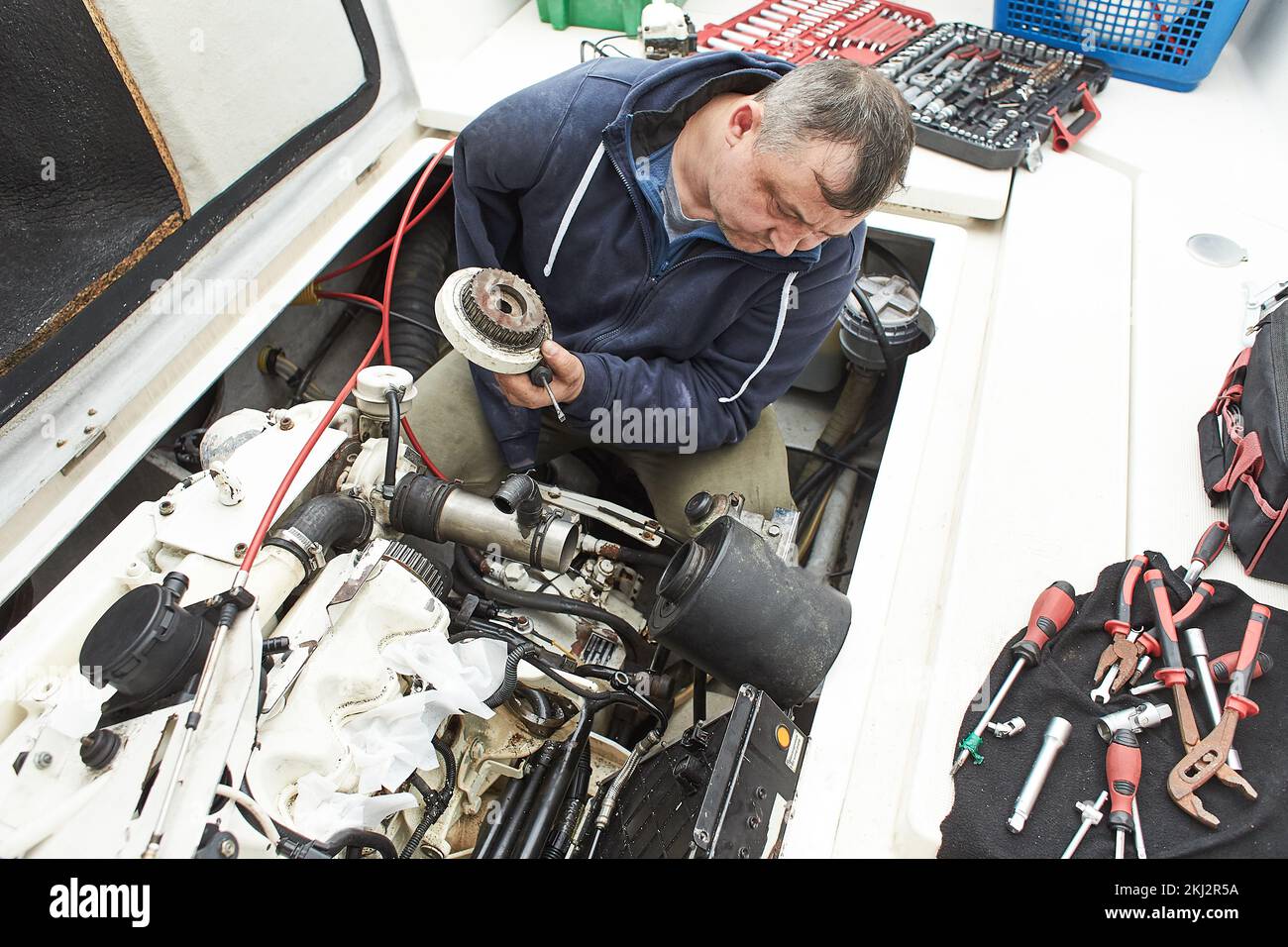 Boat Mechanic Repairing A Ship Engine Stock Photo Alamy boat-mechanic-repairing-a-ship-engine-stock-photo-alamy