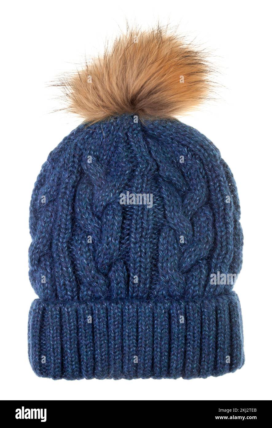 Blue woolly winter bobble hat decorated with cable knitting ornament isolated on white background. Handmade woolly cap with fake fur pompom on top Stock Photo