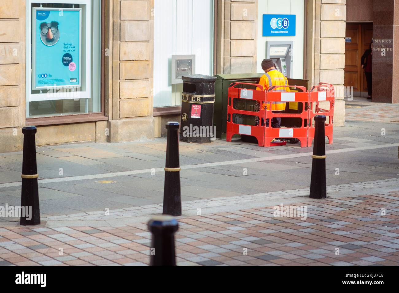 Inverness, Scotland, 15th Sep, 2022: An Openreach Telecommunications Engineer is working at a telephone junction box in Eastgate street. Stock Photo