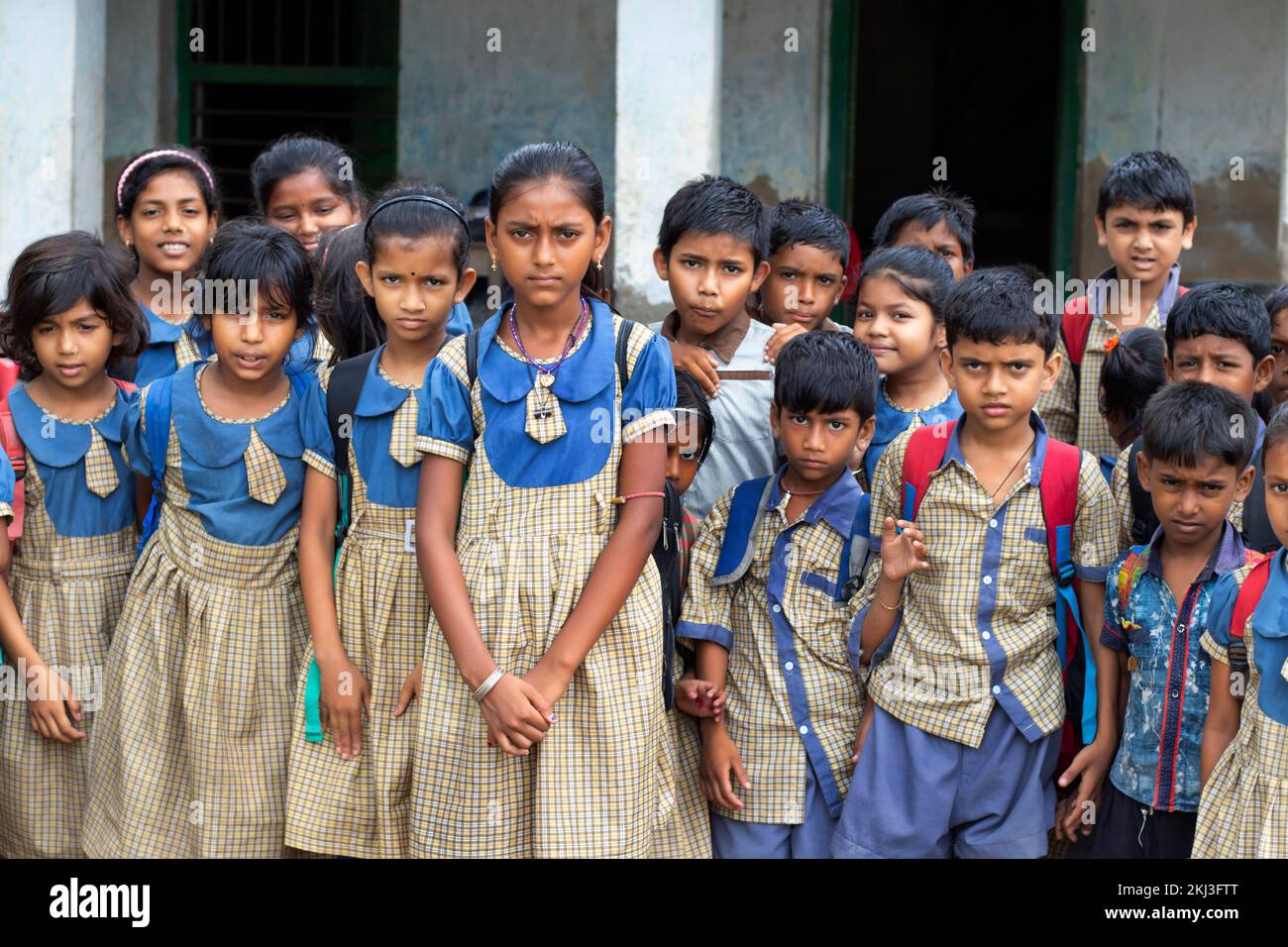 Group of school Children's standing at school Stock Photo - Alamy