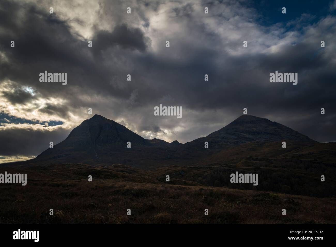 A dark, ominous, autumnal HDR image of Sail Gharbh and Sail Ghorm on Quinag in Assynt, Sutherland, Scotland. 26 October 2022. Stock Photo