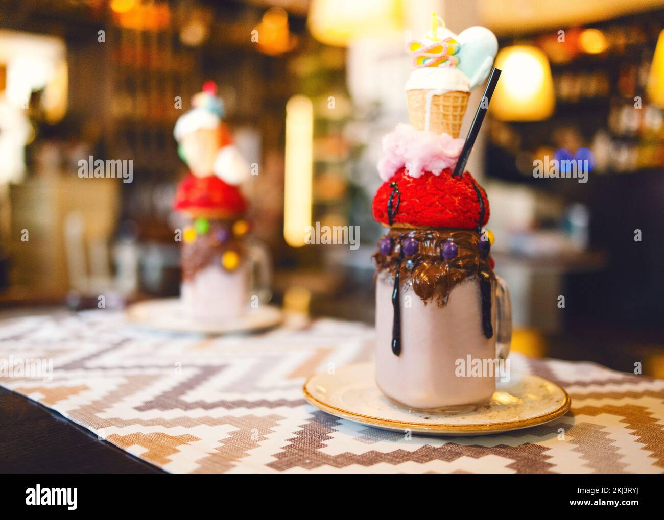 Chocolate milkshake with ice cream and whipped cream, marshmallows