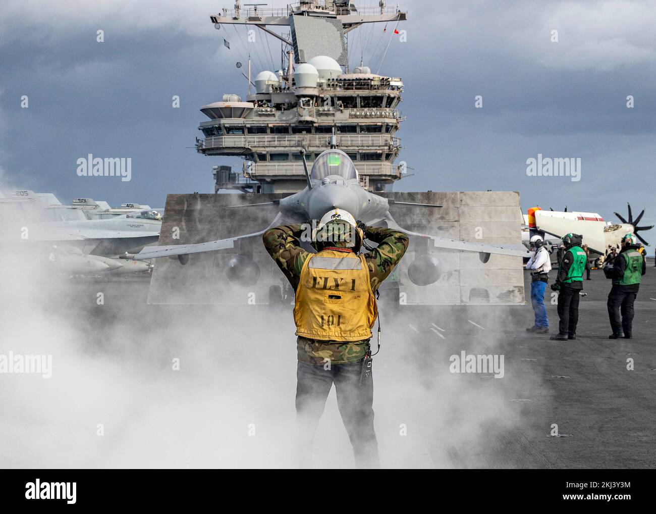 USS George HW Bush, Italy. 23rd Nov, 2022. U.S. Navy deck crews prepare a French Navy Dassault Rafale fighter jet for launch off the flight deck of the Nimitz-class aircraft carrier USS George H.W. Bush during multi-carrier operations, November 23, 2022 in the Ionian Sea. Credit: MC3 Samuel Wagner/US Navy Photo/Alamy Live News Stock Photo