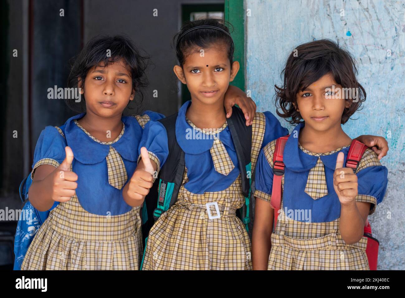 Group of School Girls  showing thumps up at school Stock Photo