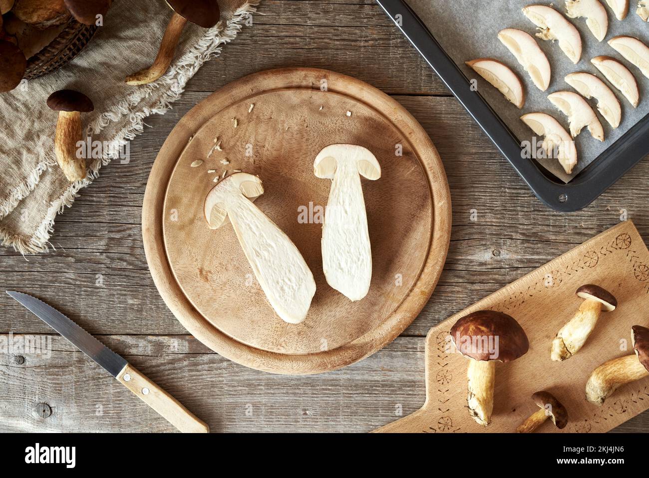 Cutting and drying fresh king bolete mushroom on a table in autumn Stock Photo Alamy