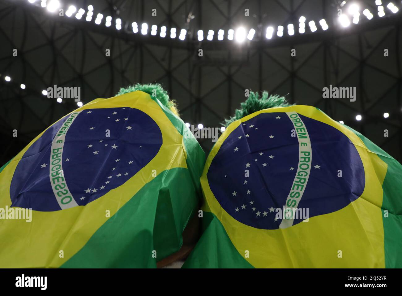 Lusail Iconic Stadium, Lusail, Qatar. 24th Nov, 2022. FIFA World Cup Football, Brazil versus Serbia; A Pair of Brazil fans wearing their nations flag as capes Credit: Action Plus Sports/Alamy Live News Stock Photo