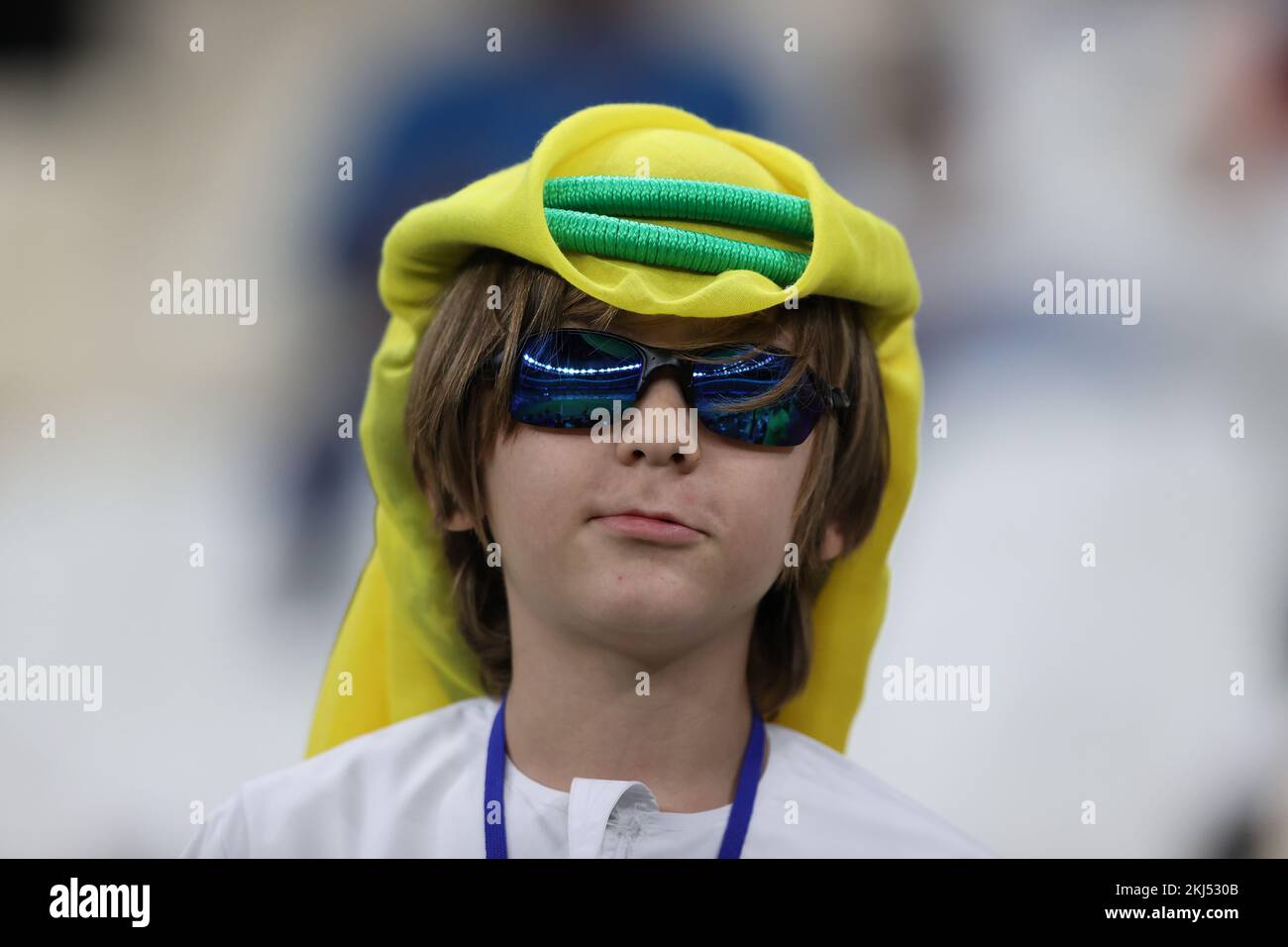 Lusail Iconic Stadium, Lusail, Qatar. 24th Nov, 2022. FIFA World Cup Football, Brazil versus Serbia; Brazil fan wearing a Kaffyeh in Brazilian colours Credit: Action Plus Sports/Alamy Live News Stock Photo