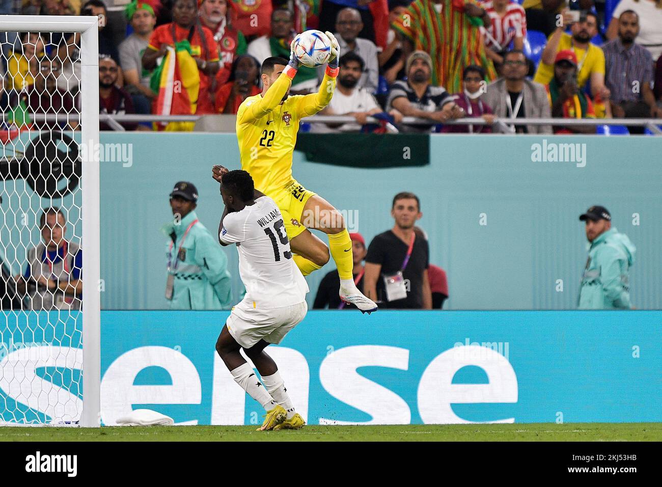 DOHA, QATAR - NOVEMBER 24: Inaki Williams of Ghana battles for the ball with Diogo Costa of Portugal during the Group H - FIFA World Cup Qatar 2022 match between Portugal and Ghana at the Stadium 974 on November 24, 2022 in Doha, Qatar (Photo by Pablo Morano/BSR Agency) Stock Photo