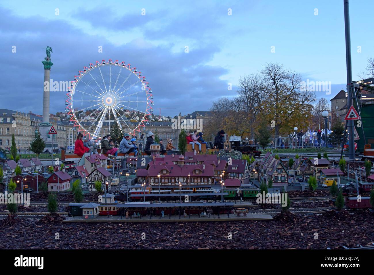 Stuttgart, Germany, 24th November 2022. People enjoying a ride on a miniature steam locomotive at Stuttgart Christmas Market. The market, with 200 illuminated and decorated stalls, a fairground and miniature railway display is open every day until 23rd December. G.P.Essex/Alamy Live News Stock Photo