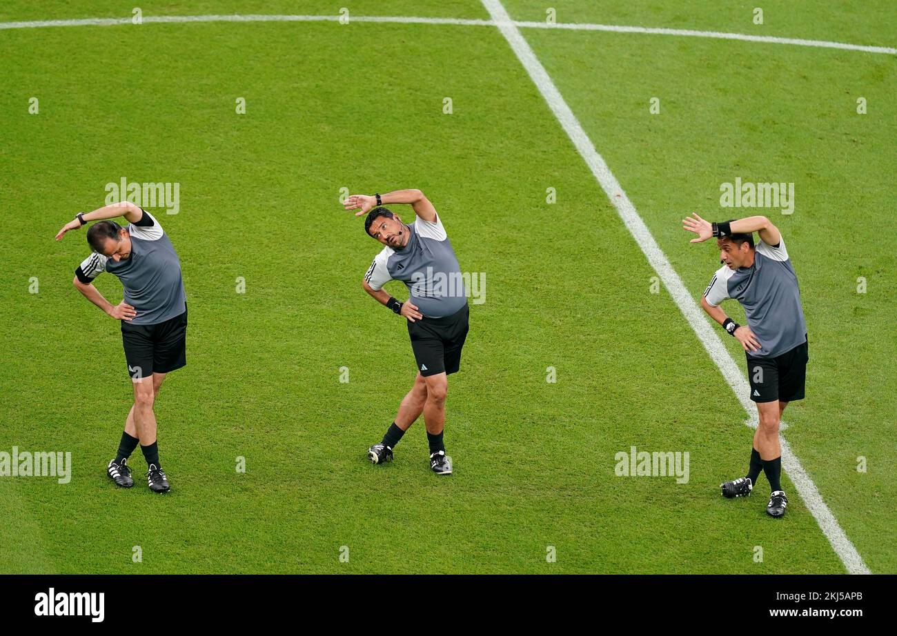Officials warm up ahead of the FIFA World Cup Group G match at the Lusail Stadium, Lusail, Qatar. Picture date: Thursday November 24, 2022. Stock Photo