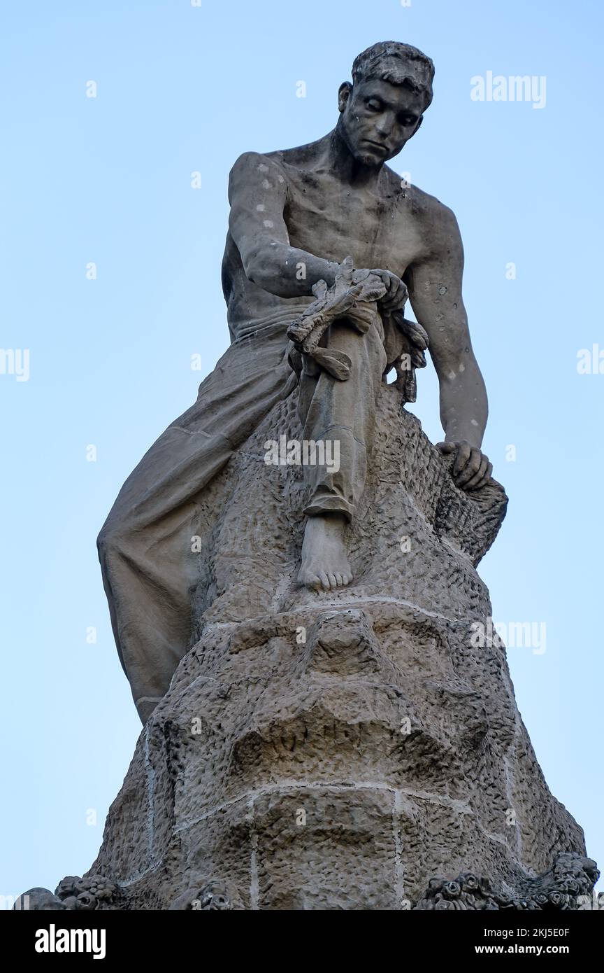 Alicante, Spain - September 12, 2022: Detail of a landmark statue to Jose Canalejas in Canalejas park. The detail comprises a man sitting atop the hea Stock Photo