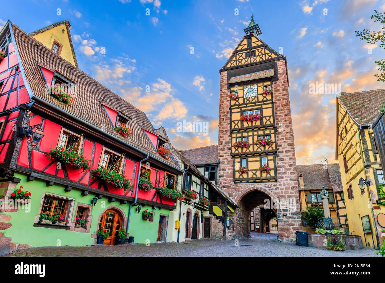 Riquewihr, Alsace. France. Picturesque street with traditional half timbered houses. Stock Photo