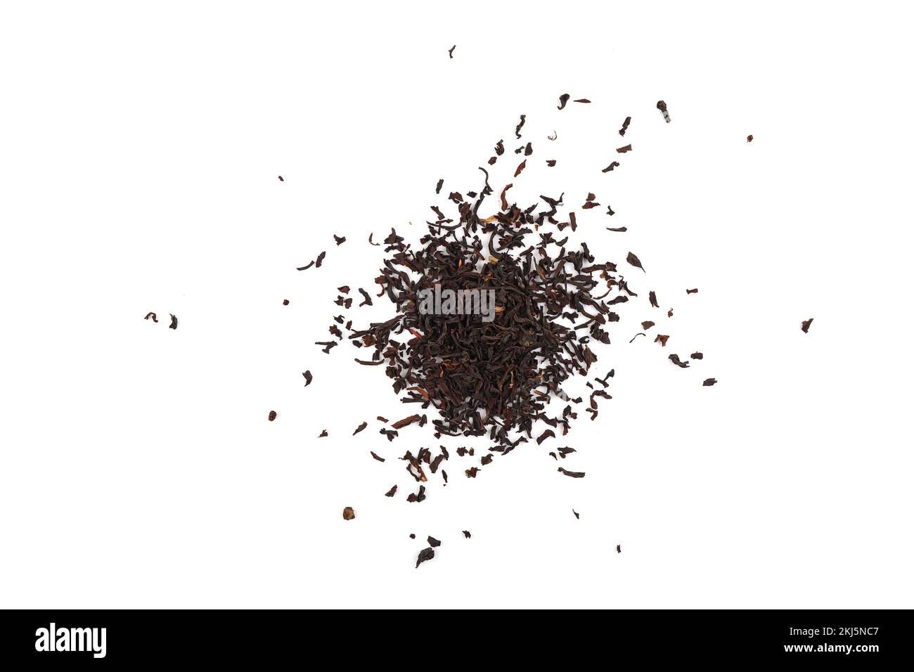 Dry black tea leaves pile isolated on white background, top view Stock