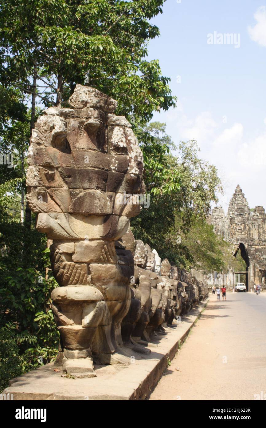 Naga and gods lining the causeway, Southern Gate, Bayon temple, Angkor Thom, Siem Reap, Cambodia. Stock Photo
