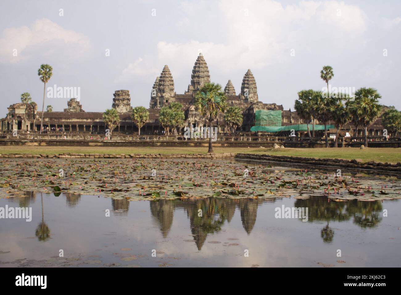 Angkor Wat reflected in a pool with water lilies, Angkor, Siem Reap, Cambodia Stock Photo