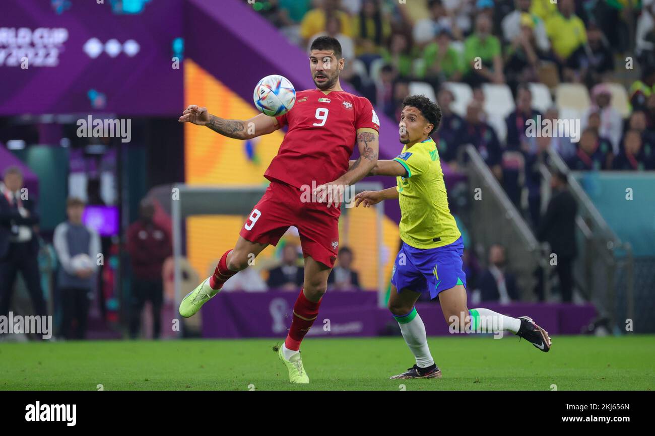 Serbian goalkeeper Aleksandar Mitrovic and Brazilian Marquinhos fight for the ball during a soccer game between Brazil and Serbia, in Group G of the FIFA 2022 World Cup in Lusail, State of Qatar on Thursday 24 November 2022. BELGA PHOTO VIRGINIE LEFOUR Credit: Belga News Agency/Alamy Live News Stock Photo