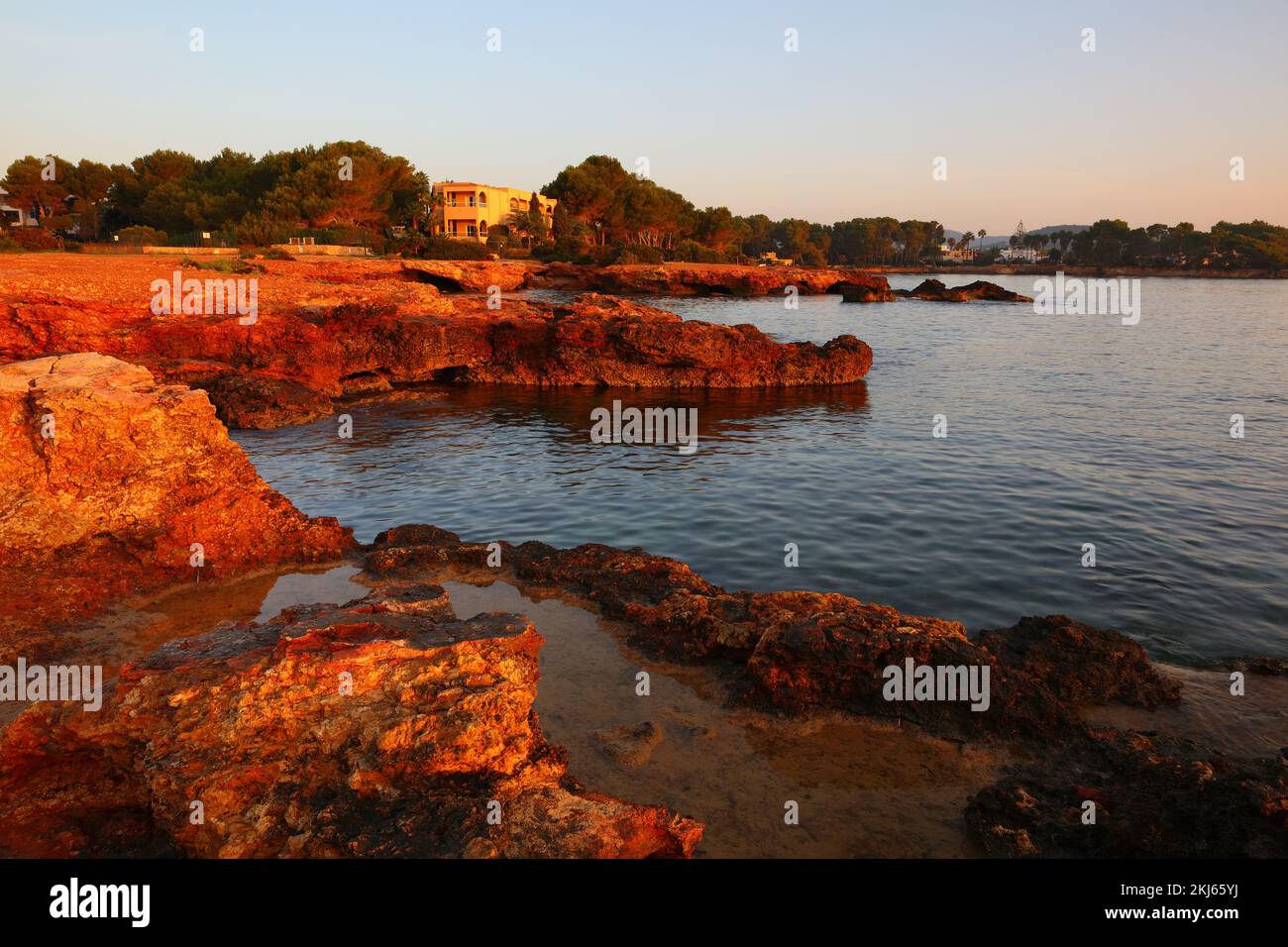 Rock Formations at Bombay beach, Santa Eulalia, Ibiza, Spain. Stock Photo