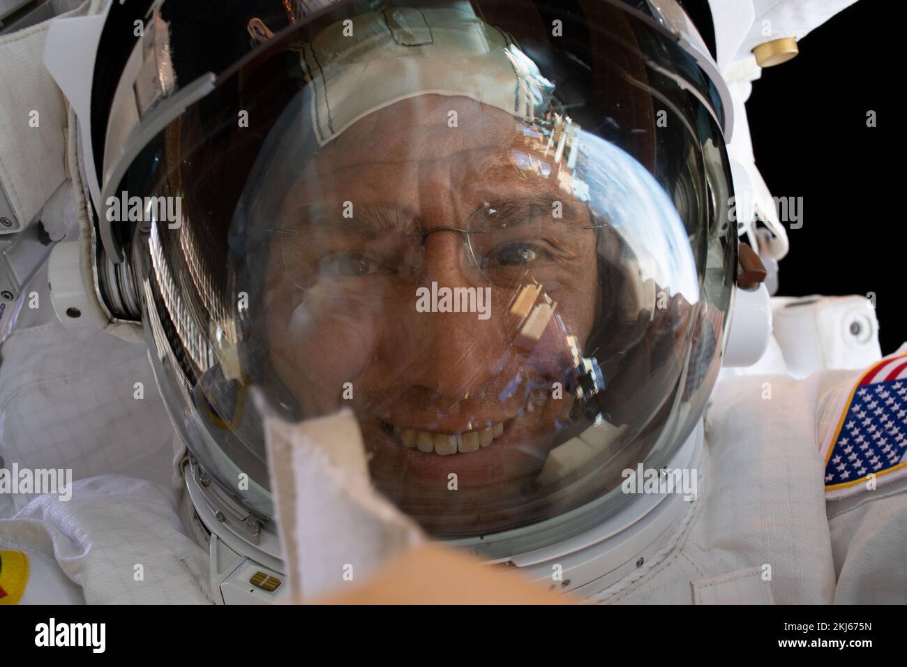 International Space Station, Earth Orbit. 15 November, 2022. NASA astronaut and Expedition 68 Flight Engineer Frank Rubio takes a selfie during a spacewalk outside the International Space Station, November 15, 2022 in Earth Orbit. The 7 hours and 11 minute spacewalk to assemble a mounting bracket was the first for Rubio and fellow astronaut Josh Cassada.  Credit: Frank Rubio/NASA/Alamy Live News Stock Photo