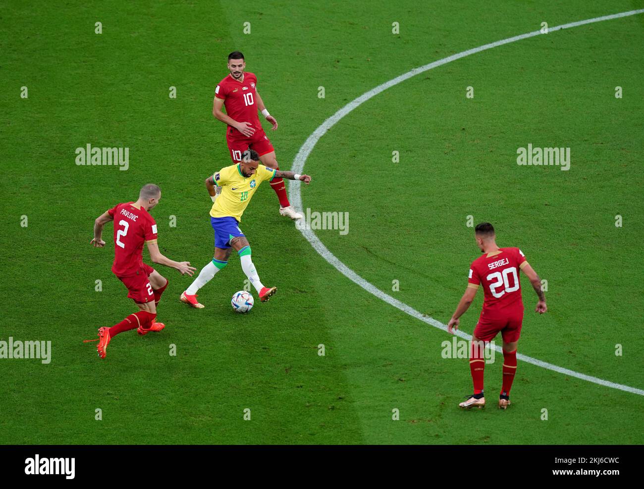 Brazil’s Neymar is surrounded by Serbia’s Strahinja Pavlovic (left) Dusan Tadic (top) and Sergej Milinkovic-Savic (right) during the FIFA World Cup Group G match at the Lusail Stadium, Lusail, Qatar. Picture date: Thursday November 24, 2022. Stock Photo