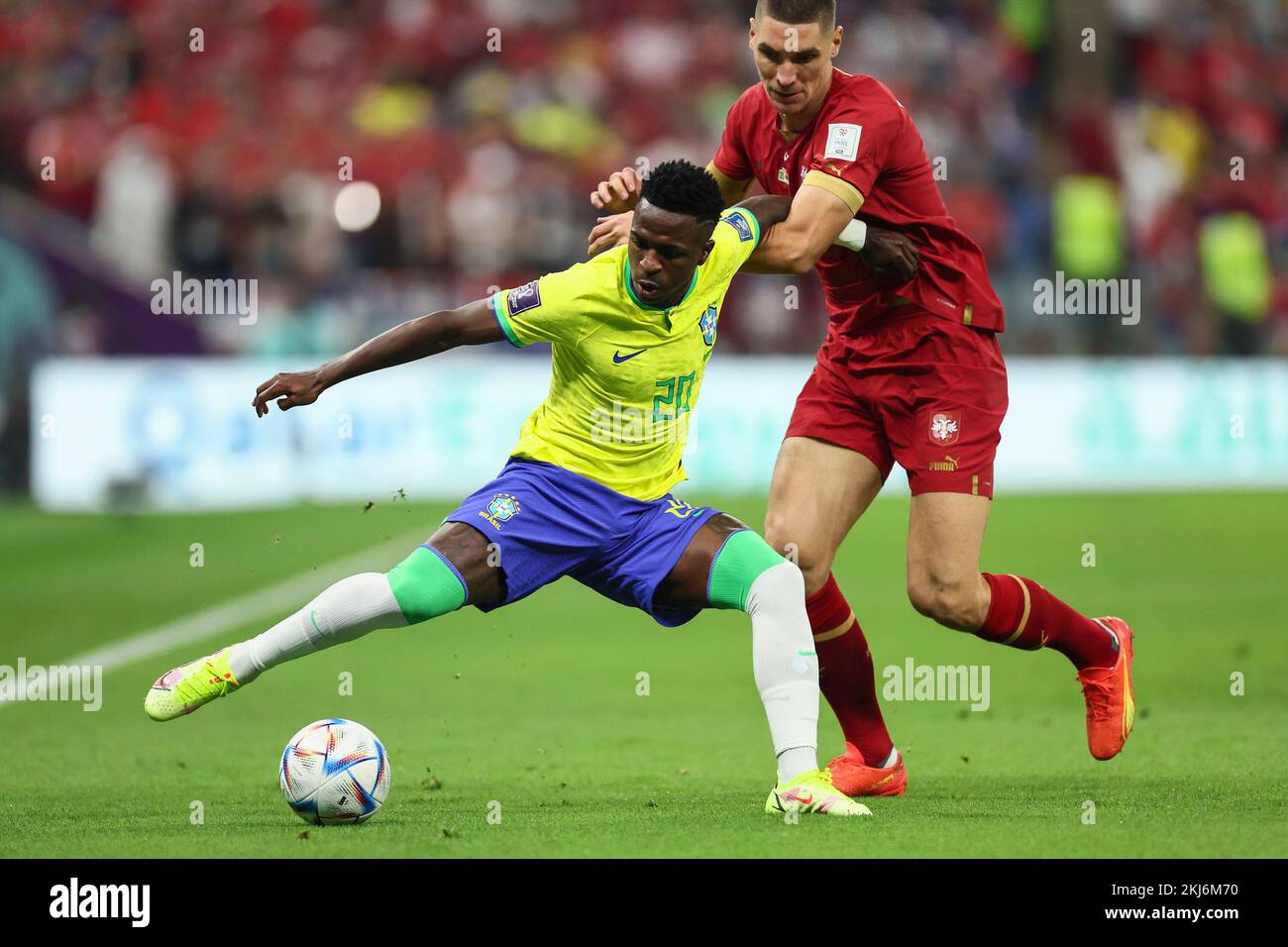 Lusail, Qatar. 24th Nov, 2022. Vinicius Junior (L) of Brazil competes during the Group G match between Brazil and Serbia at the 2022 FIFA World Cup at Lusail Stadium in Lusail, Qatar, Nov. 24, 2022. Credit: Lan Hongguang/Xinhua/Alamy Live News Stock Photo