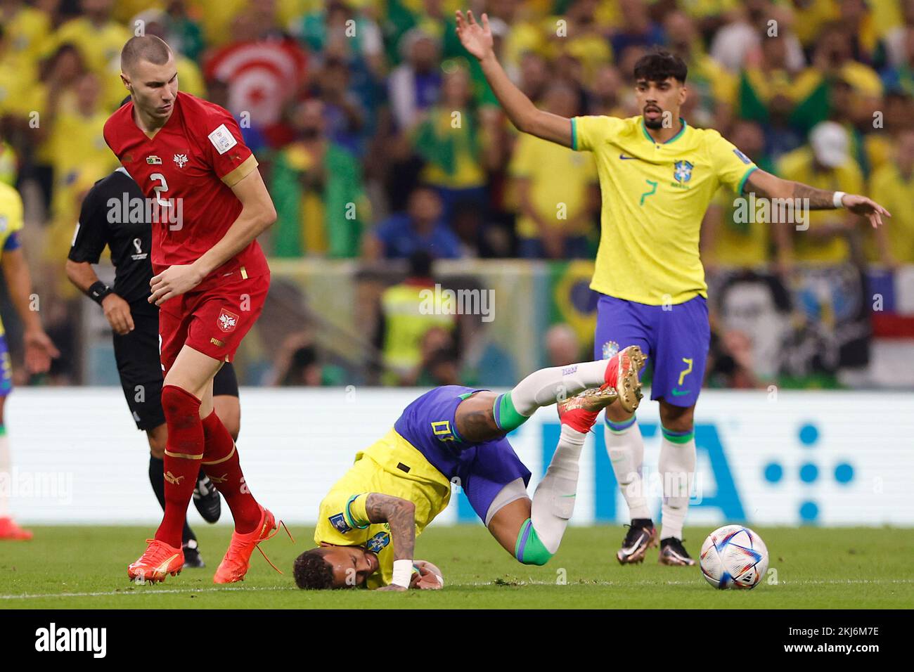 Lusail, Qatar. 24th Nov, 2022. Neymar (C) of Brazil falls down during the Group G match between Brazil and Serbia at the 2022 FIFA World Cup at Lusail Stadium in Lusail, Qatar, Nov. 24, 2022. Credit: Wang Lili/Xinhua/Alamy Live News Stock Photo