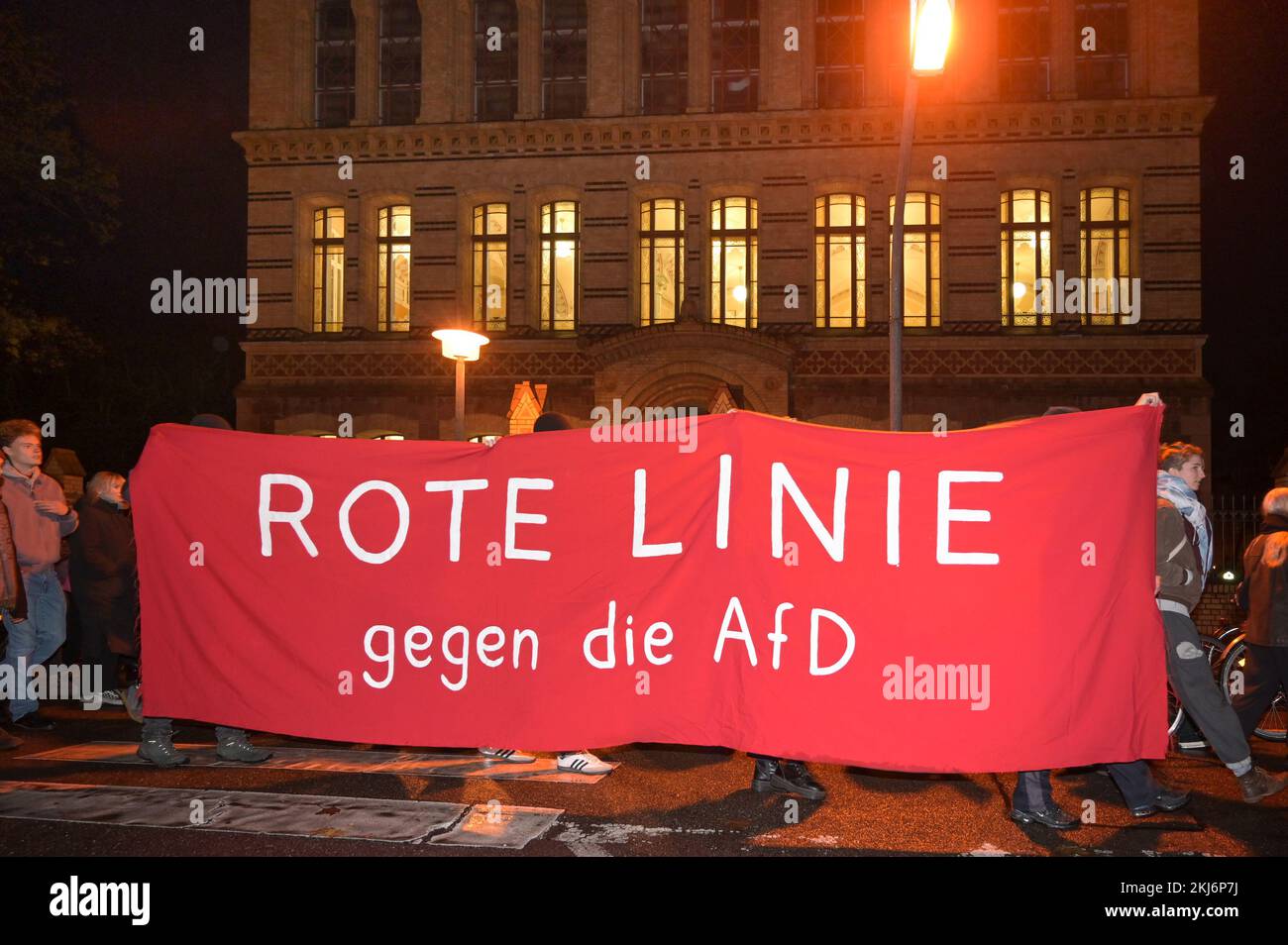 24 November 2022, Saxony-Anhalt, Halle (Saale): A counter-demonstration ...