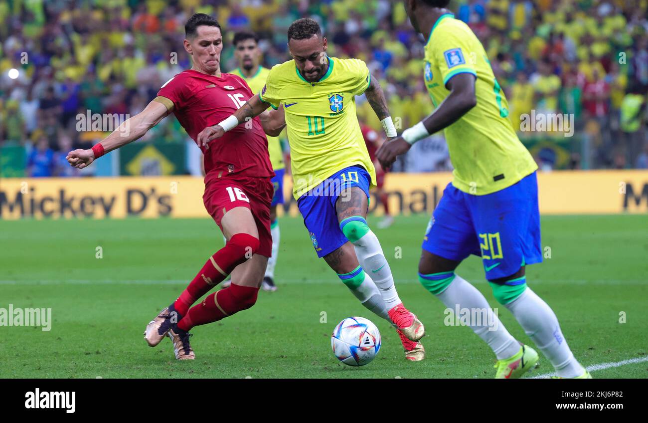 Serbian Sasa Lukic and Brazilian Neymar fight for the ball during a soccer game between Brazil and Serbia, in Group G of the FIFA 2022 World Cup in Lusail, State of Qatar on Thursday 24 November 2022. BELGA PHOTO VIRGINIE LEFOUR Credit: Belga News Agency/Alamy Live News Stock Photo
