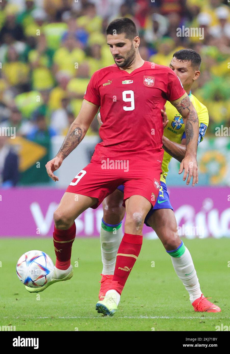 Serbian goalkeeper Aleksandar Mitrovic and Brazilian Thiago Silva fight for the ball during a soccer game between Brazil and Serbia, in Group G of the FIFA 2022 World Cup in Lusail, State of Qatar on Thursday 24 November 2022. BELGA PHOTO VIRGINIE LEFOUR Credit: Belga News Agency/Alamy Live News Stock Photo