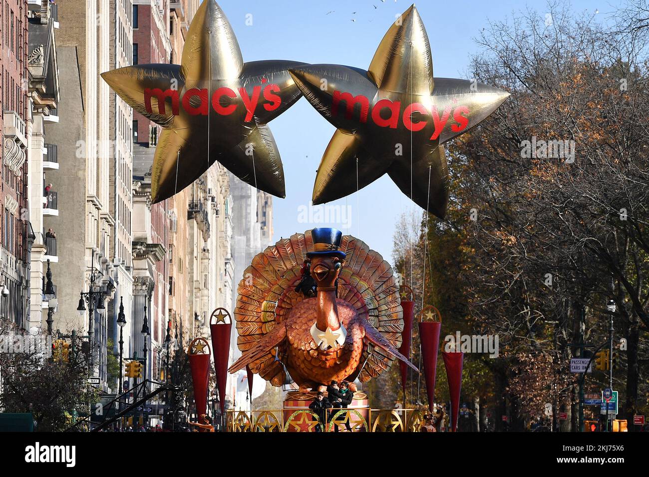 The tom turkey float leads the way down central park west during the