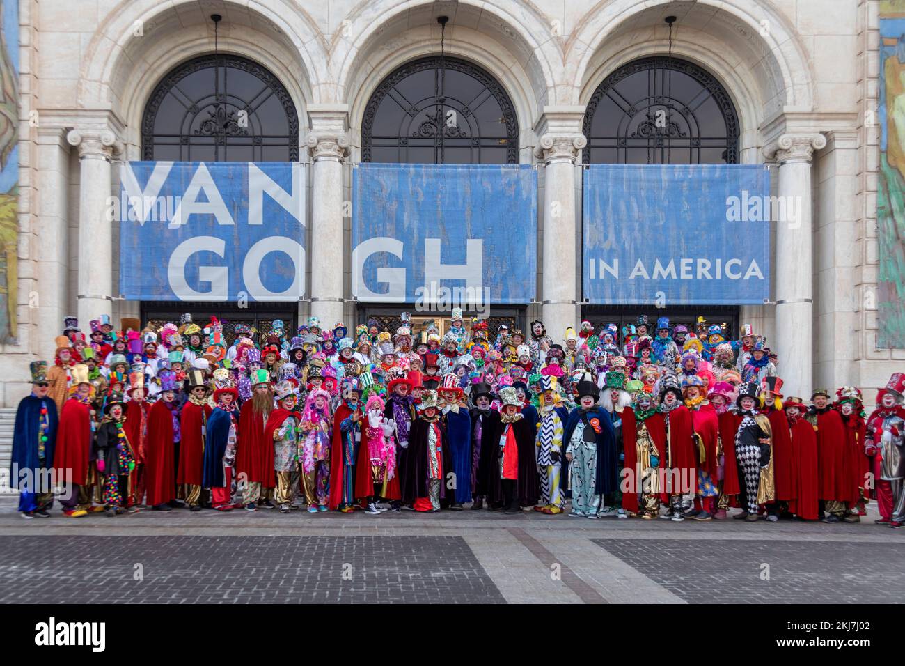 Detroit, Michigan, USA. 24th Nov, 2022. Clowns pose at the Detroit Institute of Arts before Detroit's Thanksgiving Day parade. The DIA is featuring a Van Gogh exhibit. Credit: Jim West/Alamy Live News Stock Photo