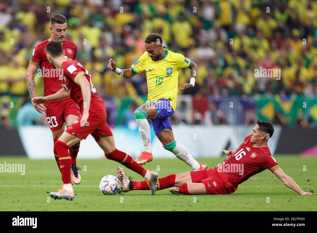 Lusail, Qatar. 24th Nov, 2022. Neymar (2nd R) of Brazil competes with Sasa Lukic (1st R) of Serbia during the Group G match between Brazil and Serbia at the 2022 FIFA World Cup at Lusail Stadium in Lusail, Qatar, Nov. 24, 2022. Credit: Wang Lili/Xinhua/Alamy Live News Stock Photo