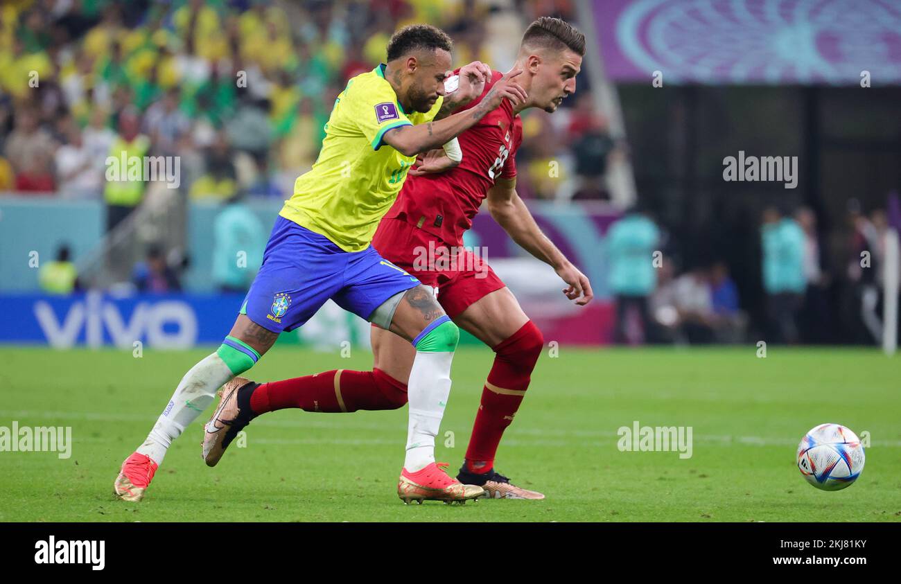 Brazilian Neymar and Serbian Sergej Milinkovic-Savic fight for the ball during a soccer game between Brazil and Serbia, in Group G of the FIFA 2022 World Cup in Lusail, State of Qatar on Thursday 24 November 2022. BELGA PHOTO VIRGINIE LEFOUR Credit: Belga News Agency/Alamy Live News Stock Photo