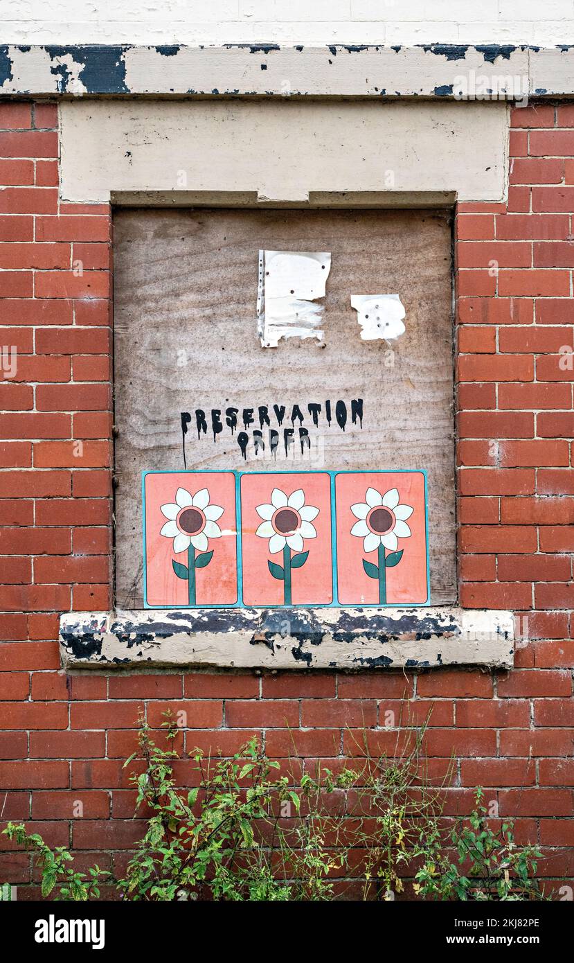 Boarded up window of derelict house (demolished 2023) Stock Photo