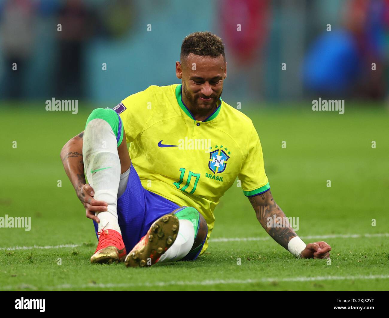 Doha, Qatar, 24th November 2022. Neymar Jr of Brazil holds his ankle  during the FIFA World Cup 2022 match at Lusail Stadium, Doha. Picture credit should read: David Klein / Sportimage Credit: Sportimage/Alamy Live News Stock Photo