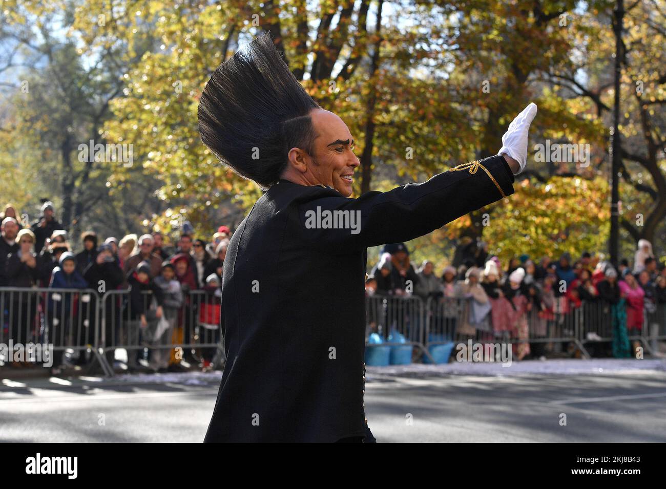 New York, USA. 24th Nov, 2022. A Cirque de Soleil performer greets parade watches as he walks down Central Park West during the 96th Annual Macy's Thanksgiving Day Parade in New York, NY, November 24, 2022. (Photo by Anthony Behar/Sipa USA) Credit: Sipa USA/Alamy Live News Stock Photo