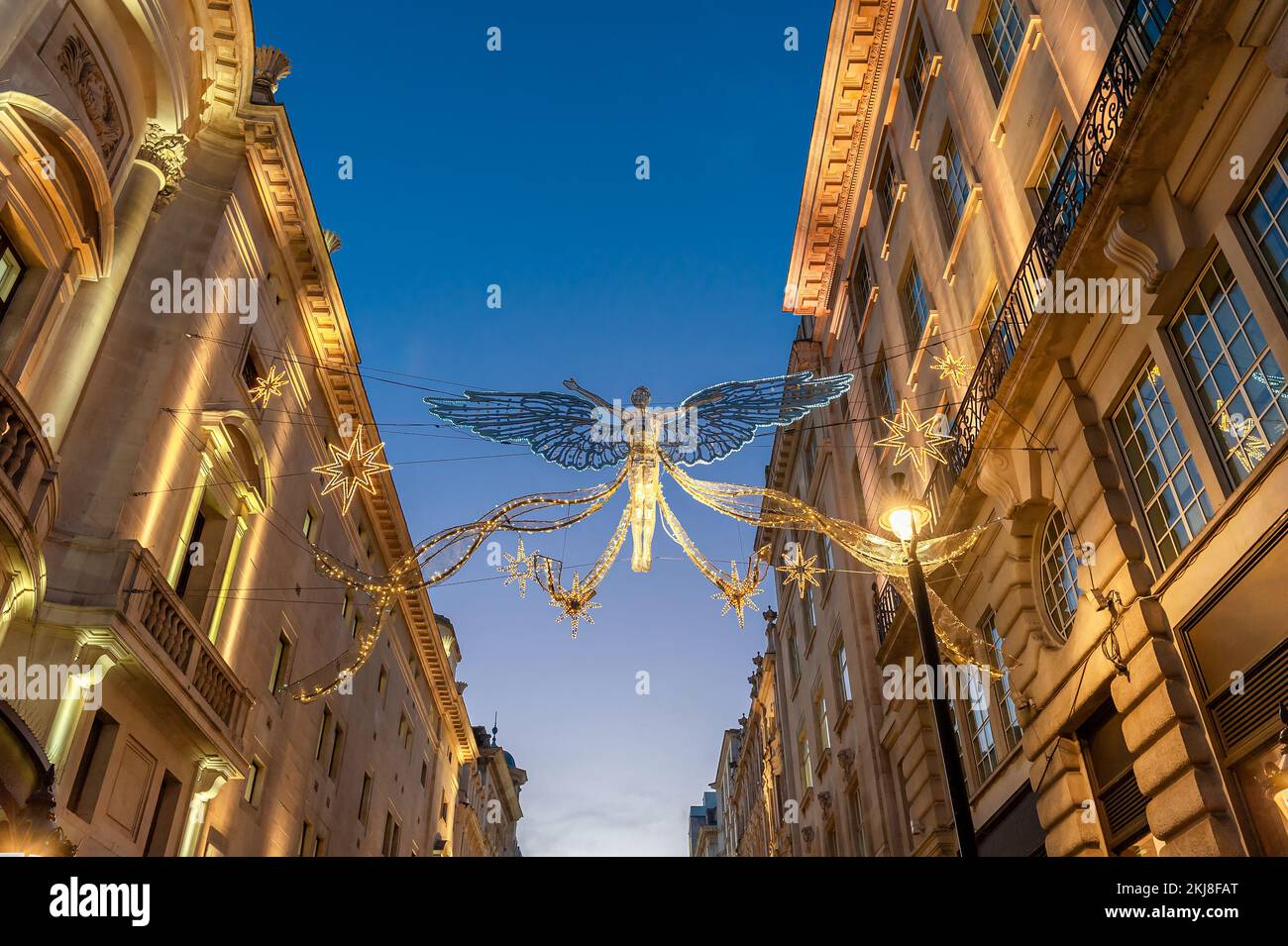 Christmas angels decorations outdoors, on the architecture in the City of London, in England Stock Photo