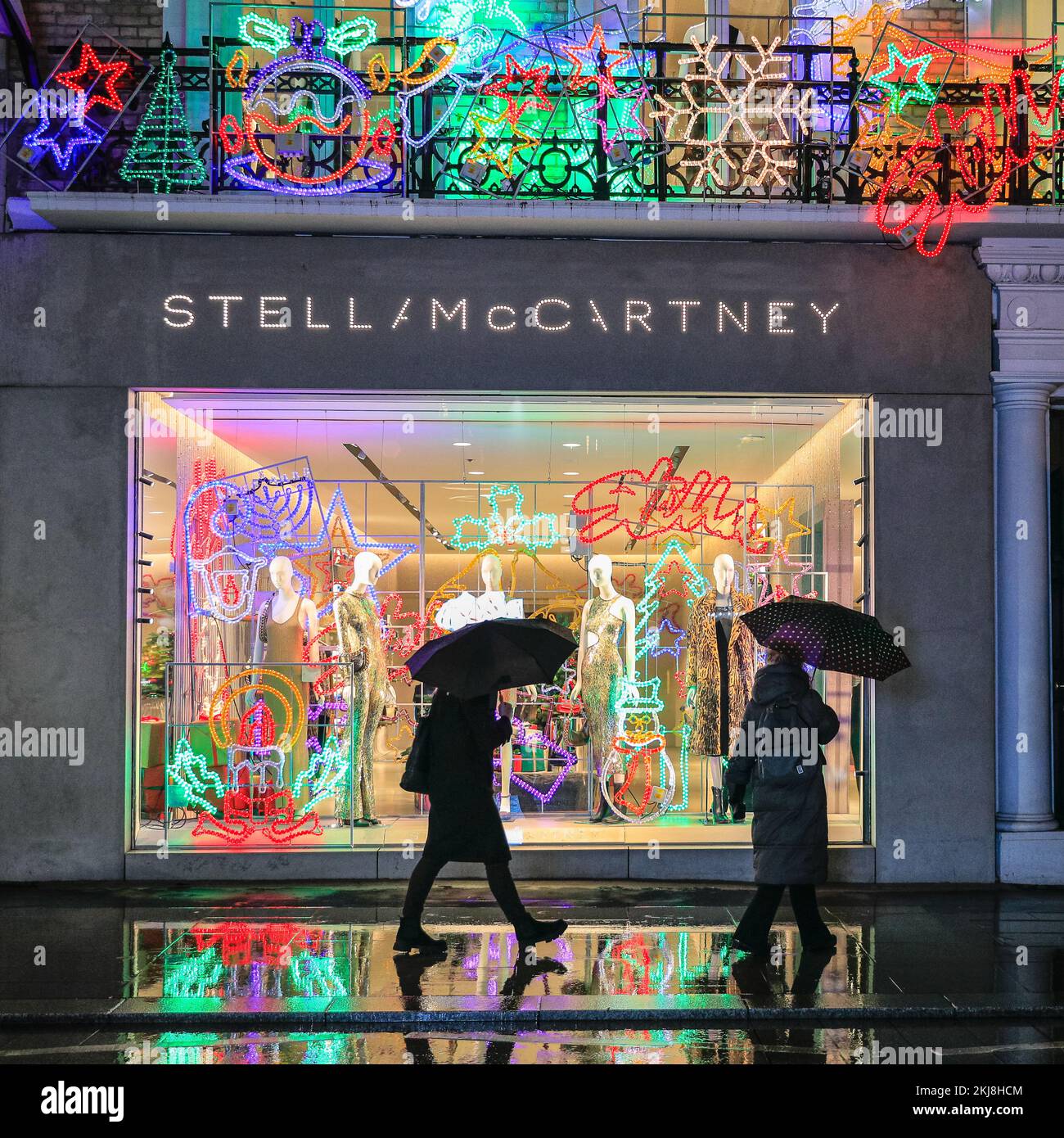 London, UK. 24th Nov, 2022. Colourful window displays at the Louis Vuitton  store. People in Bond Street, Mayfair's famous shopping street, and along  Piccadilly browse shop windows and admire the many colourful