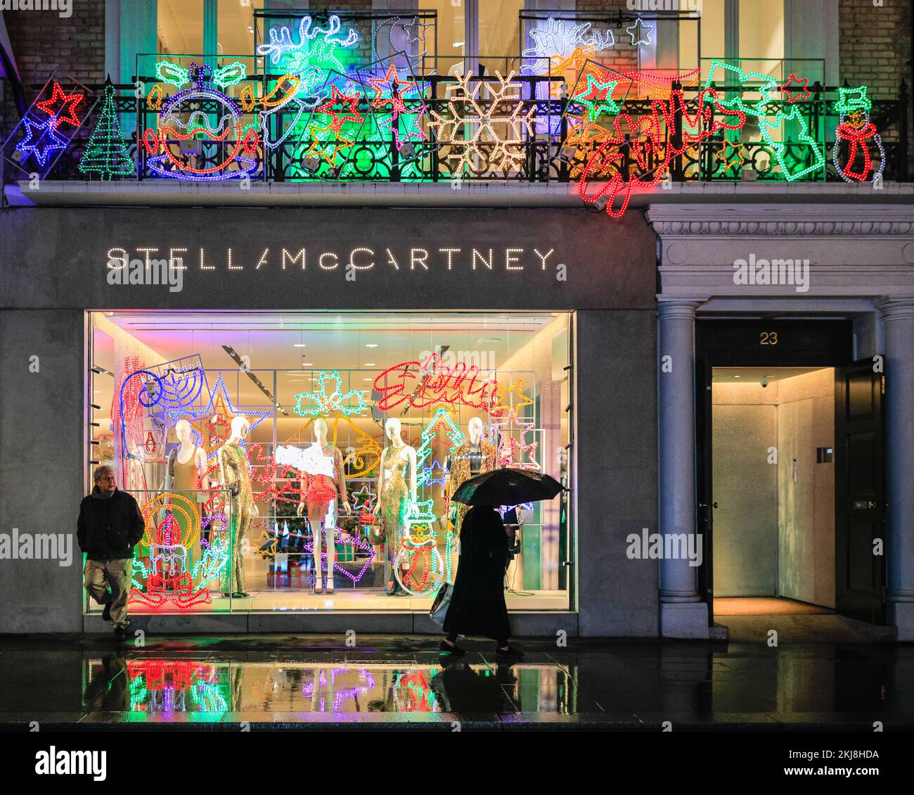 stella mccartney store, storefront at night Stock Photo - Alamy