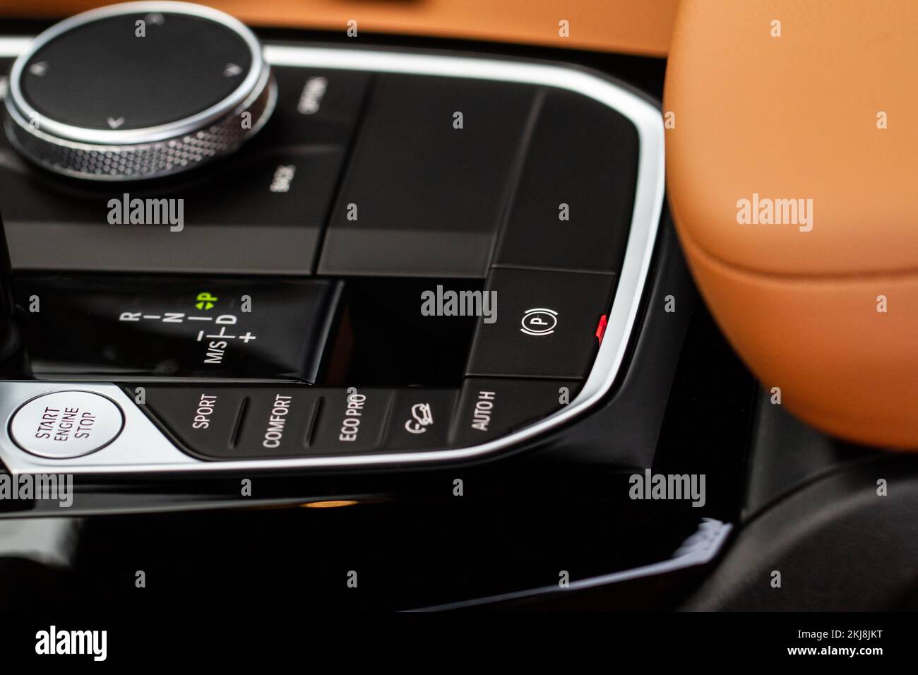 Parking brake of a modern car. Electronic handbrake. Modrn car hand brake, parking button. EPB