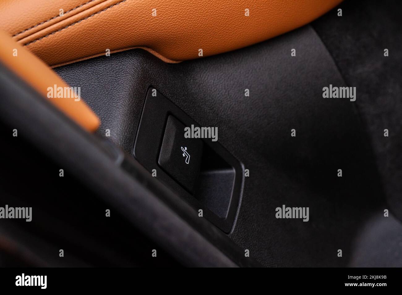 Electric car seat adjustment control panel close up view. Adjustable