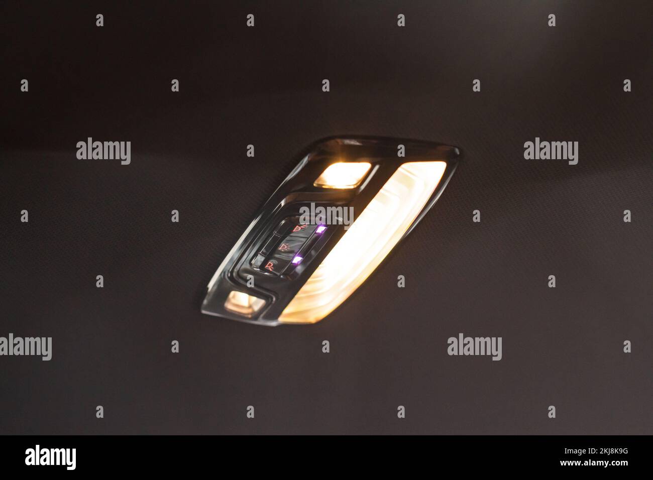 Car ceiling lamp in a car. Modern car interior lights closeup Stock