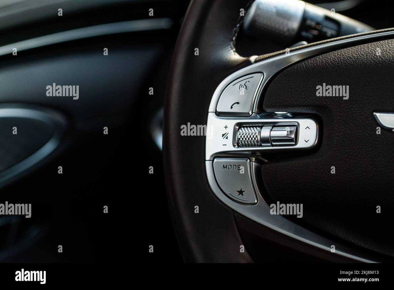 Call buttons on car steering wheel. Audio control buttons on the