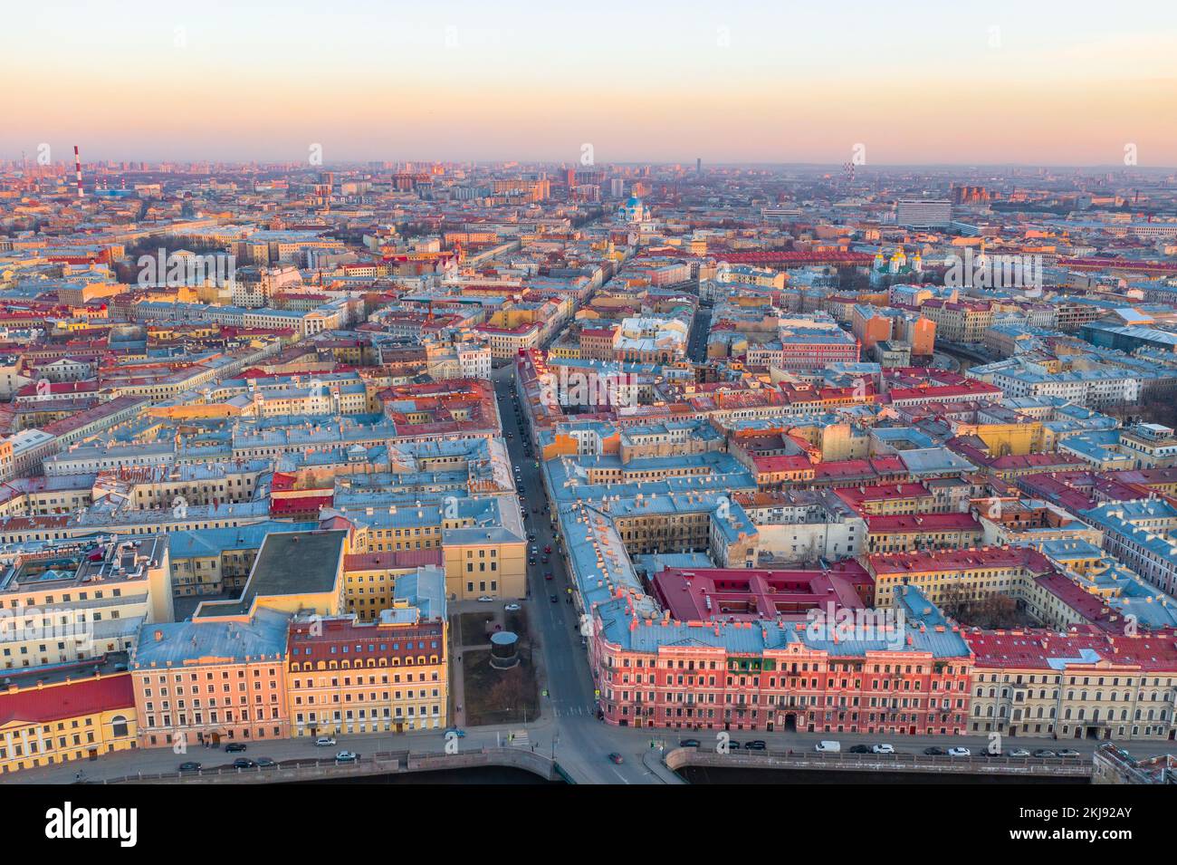 Cityscape of Saint-Petersburg. Aerial view to the southern part of the city from the center, Trinity Cathedral. Evening sunset light Stock Photo