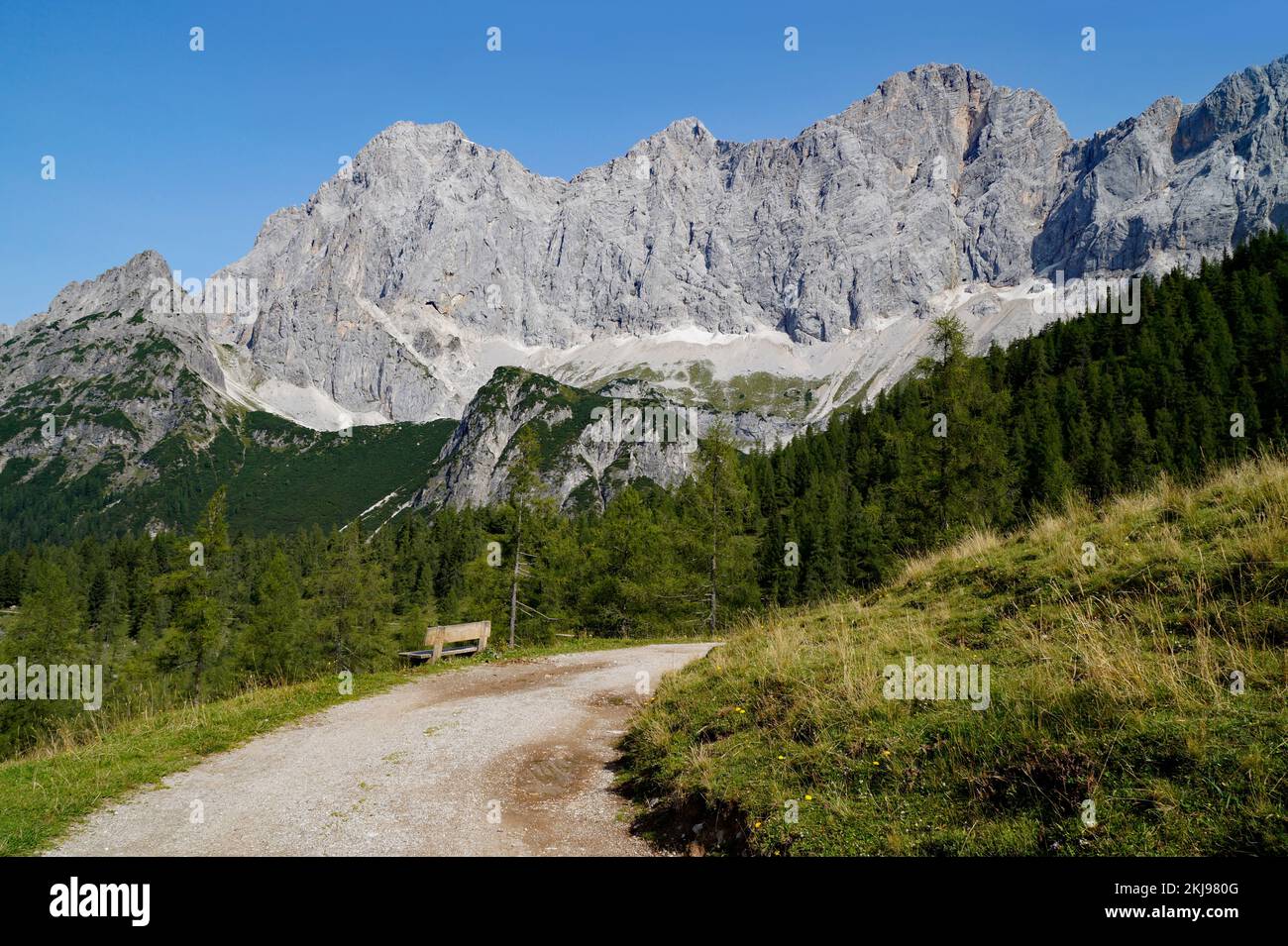 a hiking trail leading through the picturesque alpine landscape by the ...