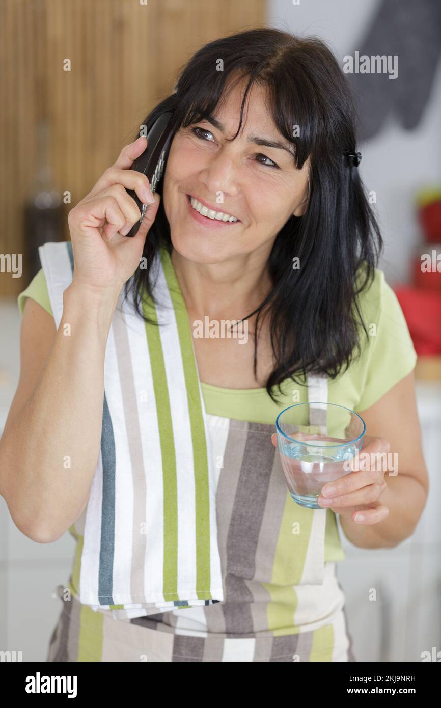 carefree woman talking on the phone Stock Photo