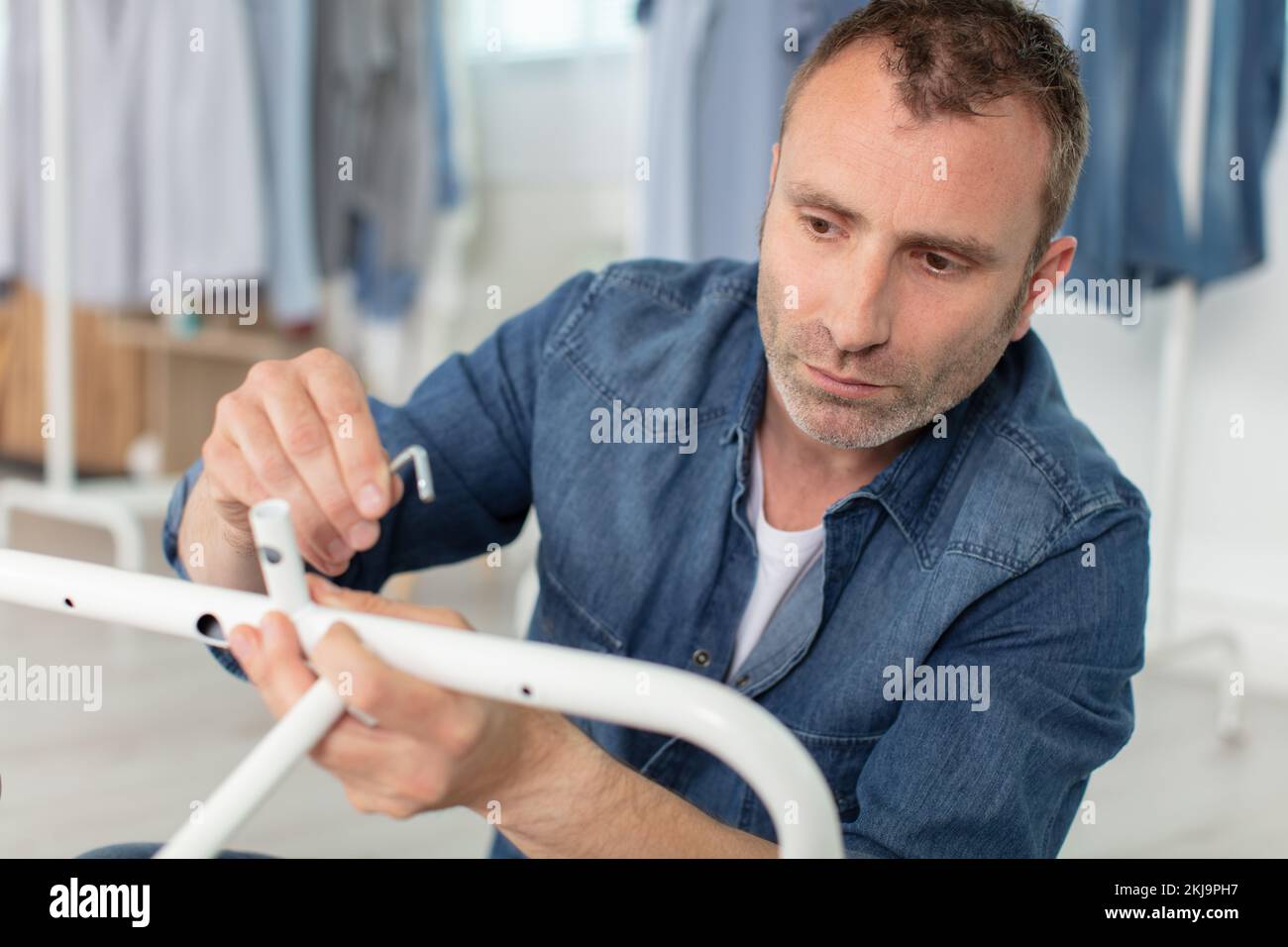 man uses furniture allen key hexagon Stock Photo Alamy