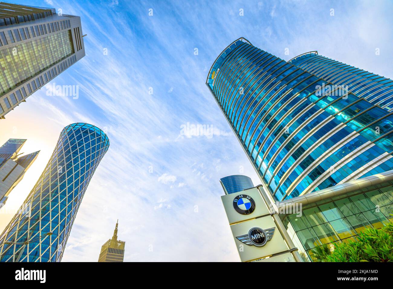 Doha, Qatar - February 17, 2019: perspective view of BMW and Mini logo at Alfardan Towers in the West Bay commercial district. Skyscrapers in Doha Stock Photo